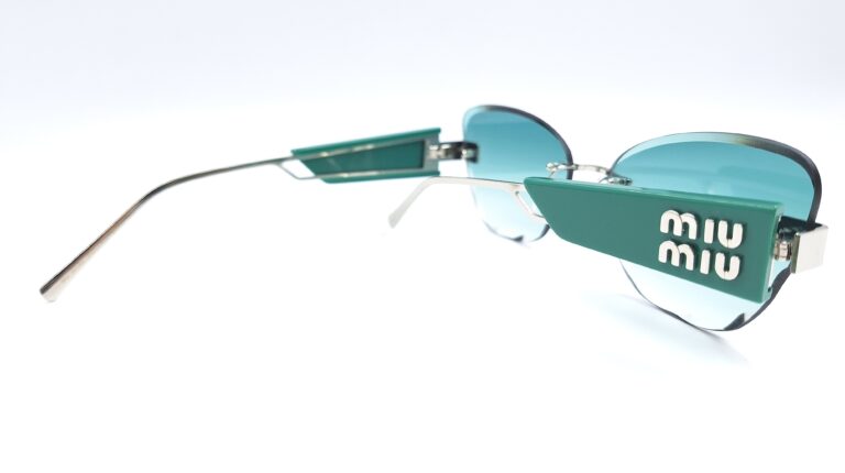 Солнцезащитные очки Miu Miu MU 127AV - Фото 6