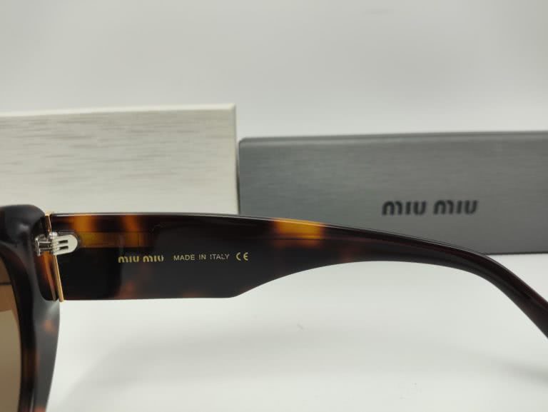 Солнцезащитные очки MIU MIU SMU03 UES-A4 - Фото 5